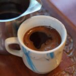 A e Mbron Kafeja Mëlçinë Nga Prekja e Sëmundjevee?